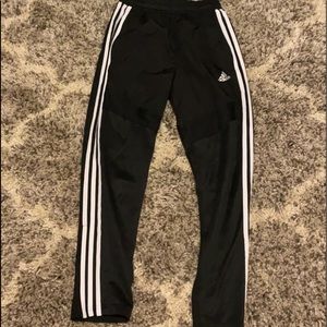 black adidas joggers with zippers on the bottoms